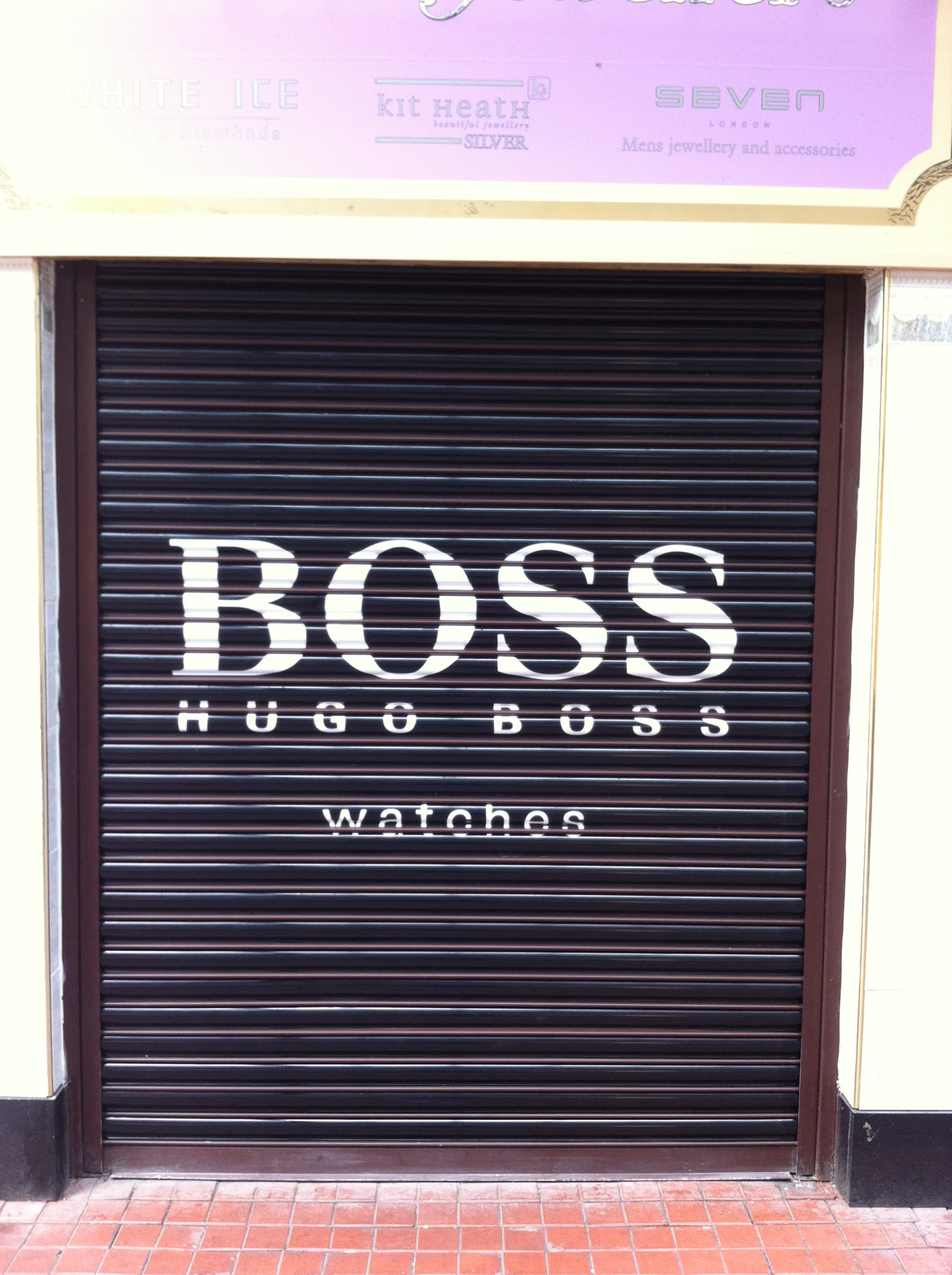 Commercial roller shutter graphics on a corner unit designed, printed and installed by Shutter Media in the North East.