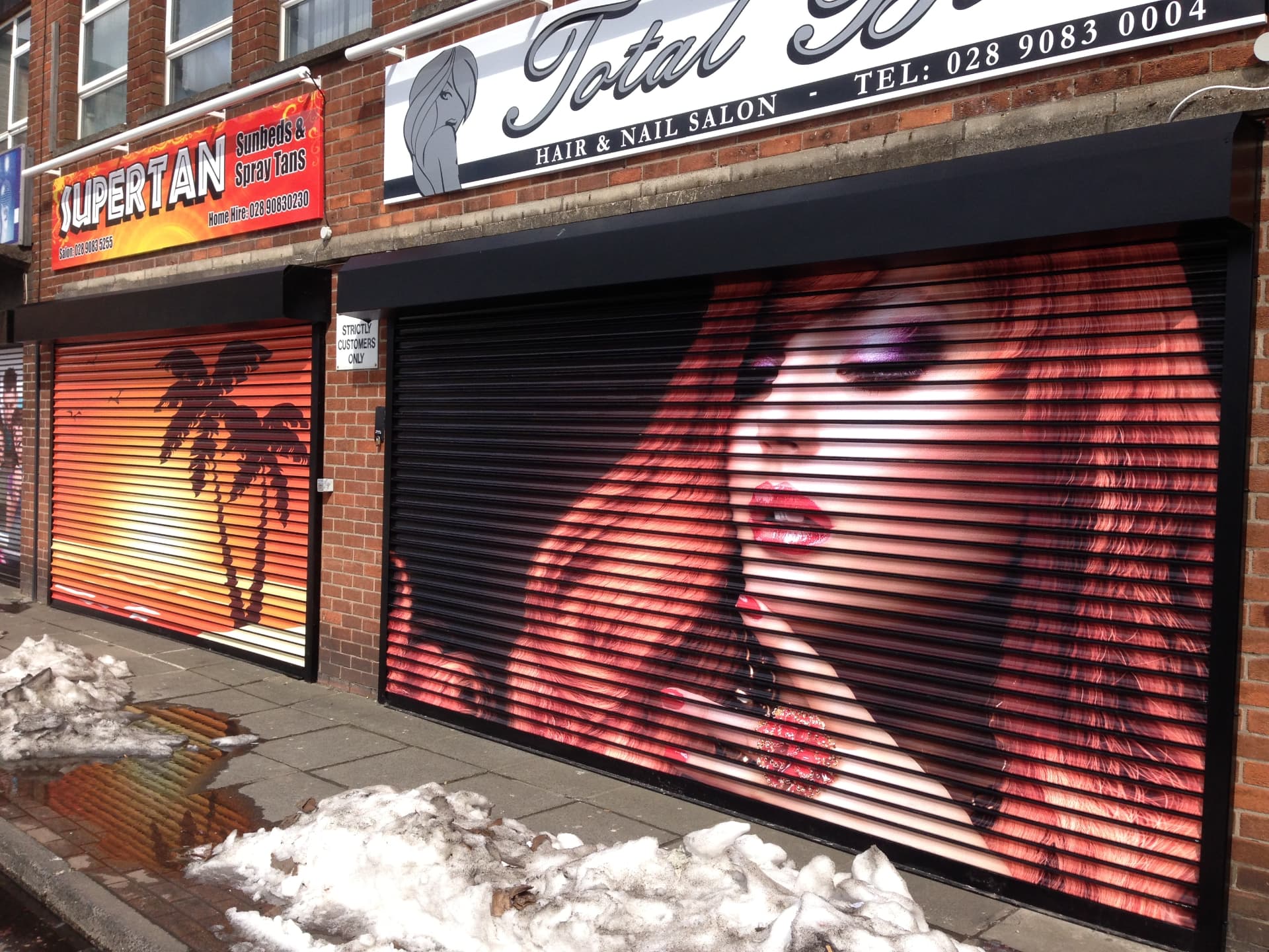 Printed roller shutter advertising a food and drink brand designed, printed and installed by Shutter Media in Newcastle upon Tyne.