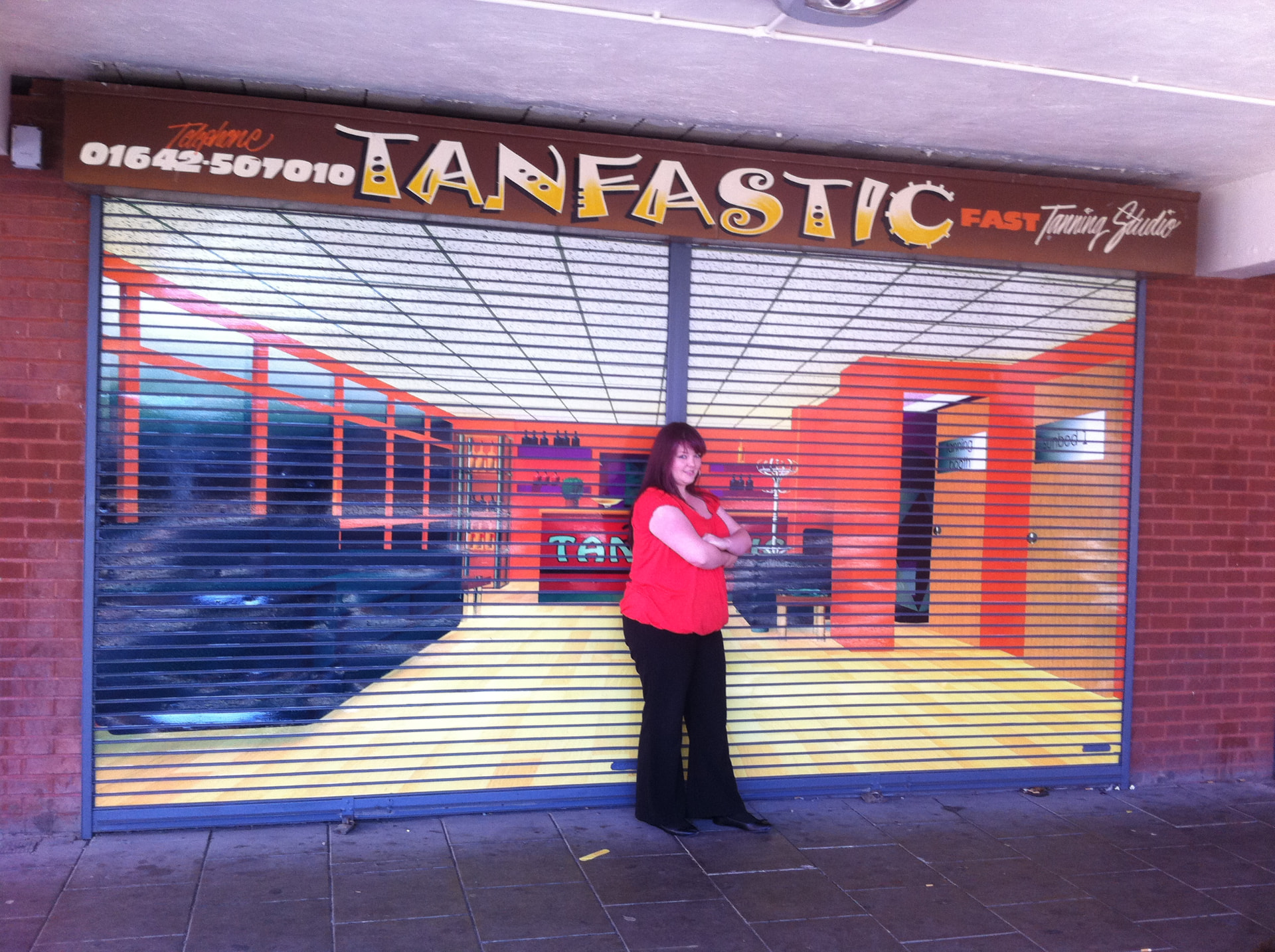 Full-colour shutter wrap on a high street shop designed, printed and installed by Shutter Media in Stockton-on-Tees.