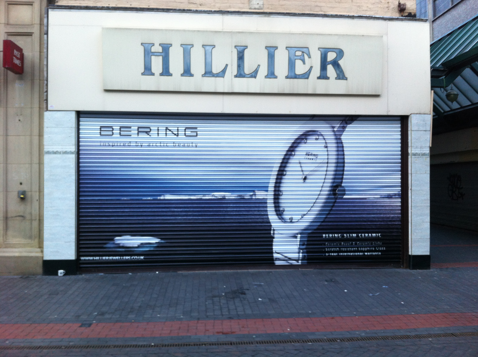 Full-colour shutter wrap on a high street shop designed, printed and installed by Shutter Media in Stockton-on-Tees.