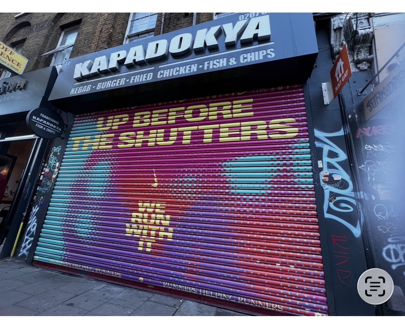 Nike Up Before the Shutters running campaign artwork across a closed takeaway roller shutter