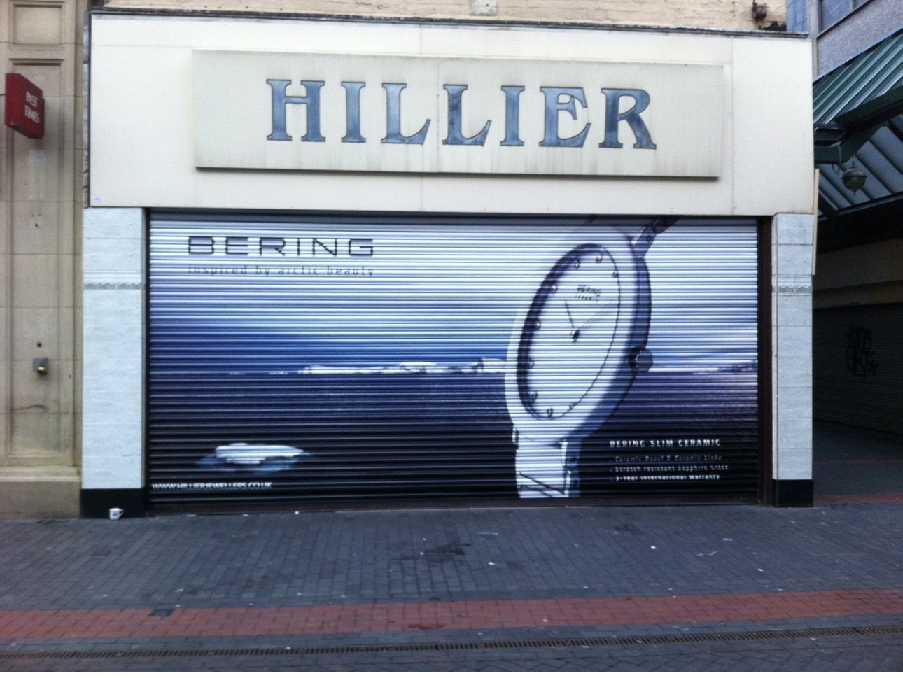 Bering watches advertising artwork installed across a closed shop roller shutter
