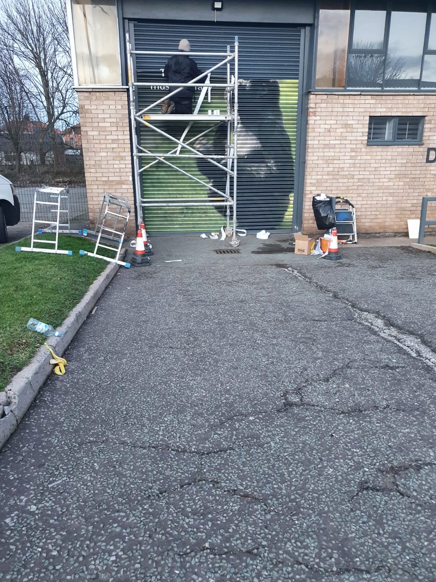 Printed roller shutter graphics on a retail shopfront designed, printed and installed by Shutter Media in Middlesbrough.